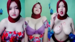 Tubuh Seksi Berbalut Hijab Merah Dengan Payudara Montok